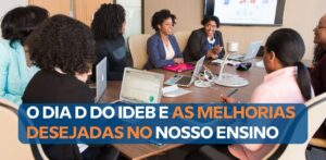 Professores e coordenador pedagógico reunidos em mesa analisando planilhas e gráficos de desempenho escolar.
